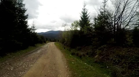 2K. Car driving through the countryside in the mountains. Stock Footage 67365023