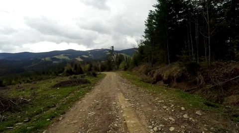 2K. Car driving through the countryside in the mountains. Stock Footage 67365512
