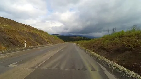 2K. Driving on a mountain rural road. Stock Footage 69250604
