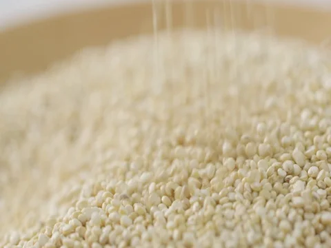 2k falling grains of quinoa macro Stock-Footage 81338055