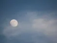 2K Film 24p - The moon in the afternoon with misty clouds Web Footage
