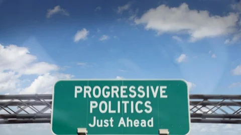 2K - Progressive Politics just ahead road sign Stock Footage