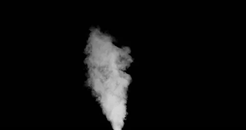 A 2k shot of steam spewing sideways from an opening on black background. Video stock 235780738