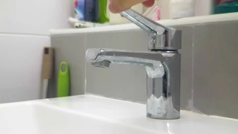 2K Slow motion of hand open and close water faucet in the sink in the restroom Stock-Footage 107971809