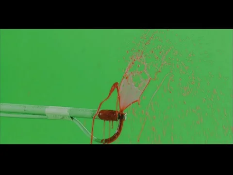 2K Smooth Continuous Blood Dripping Jet Atmospheric Layer on Green Screen Stock Footage 345673357