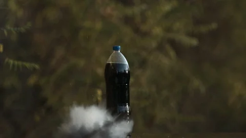 2K Super slow motion. A unique shot. The bottle takes off like a rocket. The Video stock 92537286