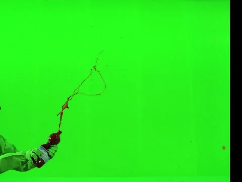 2K Sweeping Blood Arc Jet Spurt VFX Overlay on Green Background Stock Footage 345665385