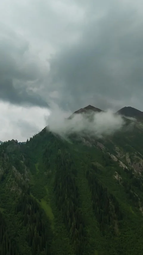 2k timelapse of mountain with moving storm clouds Stock Footage 341515965