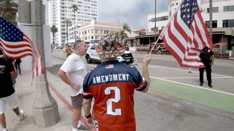 2nd Amendment Advocate Waves Flag at Rally Video stock 159772515