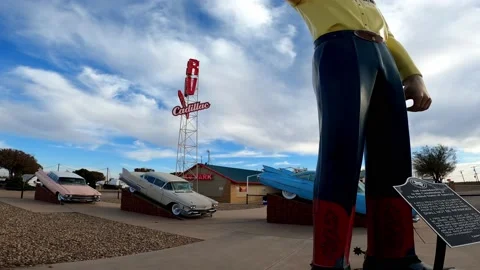 2nd Amendment Cowboy statue near Cadillac Ranch Stock Footage 233371726