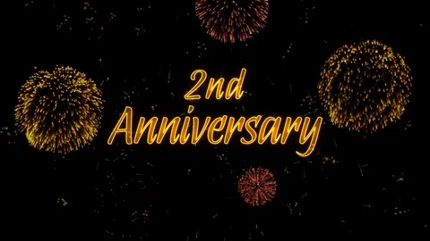 2nd Anniversary Greeting text with particles, colored fireworks, sparks Stock Footage 99056446