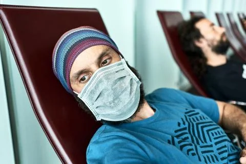 2nd of March, 2020. Doha, Qatar. Spaniard worried in the resting area waiting 库存照片