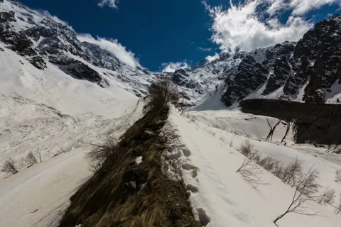 3-1-4k.   Formation of clouds on the mountain tops Tseyskogo gorge. Stock Footage 50039680