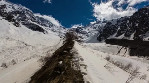 3-1-hd. Formation of clouds on the mountain tops Tseyskogo gorge. Stock Footage 50039797