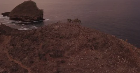 3. aerial view, bird view, of Some young men came down from the hill to the b Stock Footage 121700332