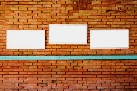 3 blank frame mock up on a brick wall. Stock Photos