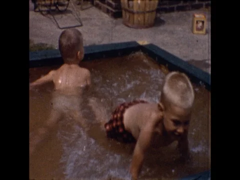 little two-cute-naked-boys-pool 1964 Cute little boy jumps into kiddie p... | Stock Video | Pond5