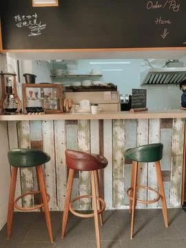 3 cafe chairs Foto stock