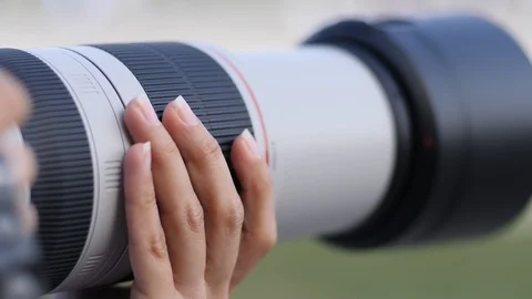 3 Camera long focus lens professional photographer woman shooting public even Video stock 94623409