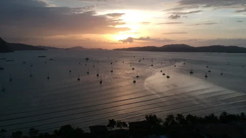 3 Clips Pack. Aerial of many yachts by the beach at sunset Langkawi Malaysia Stock Footage 138097734