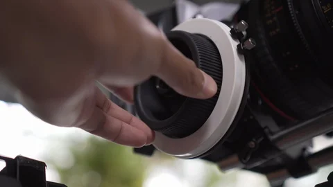 3 Clips Pack. Close up shot of man focusing the video camera. Stock Footage 104117310