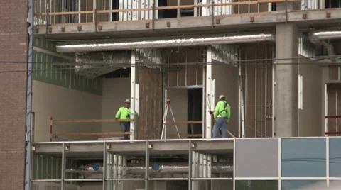 3 constructions workers on an industrial construction site 02 Stock Footage 48827071