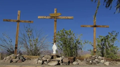 3 Crosses and Catholic St Mary statue seen in Bullhead City Arizona Stock Footage