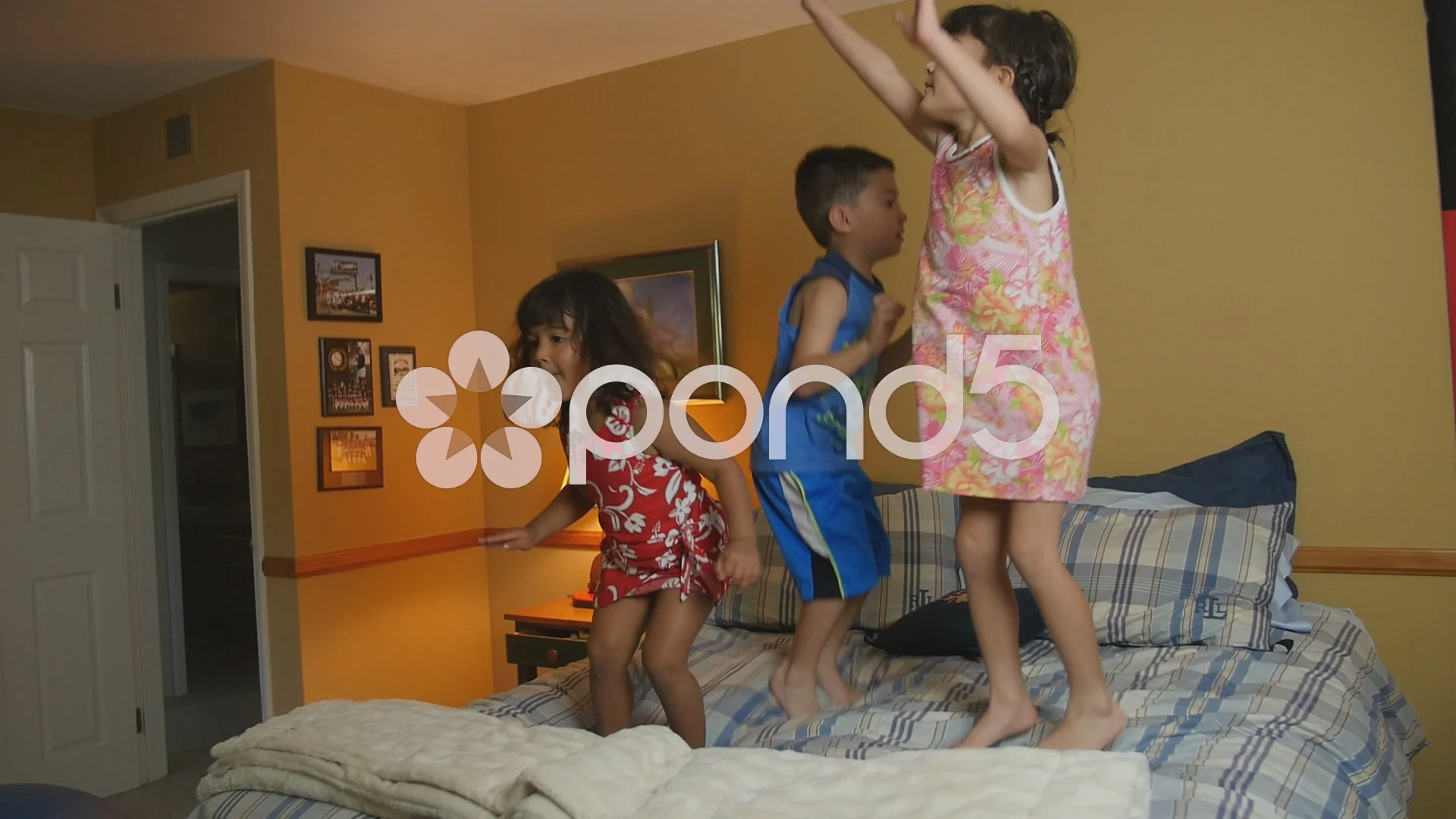 3 CUTE KIDS JUMP ON BED SLOW MOTION