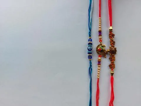 3 different rakhis(holy threads) with blank space on white background Stock Photos