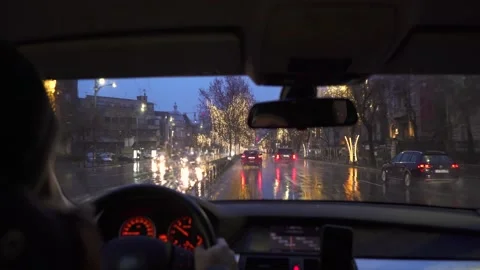 3 Driving on Bucharest city centre at dusk on a rainy day pov Video stock 150450305