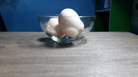 3 eggs in the bowl Stock Footage 225459075