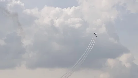 3 fighter jets in the blue sky. A general plan. Aerobatic figures. Airshow. 8 Video stock 124164870