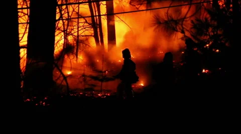 3 Fire Fighters battling wildfire Stock Footage 41831683
