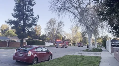 3 Firetrucks drive to emergency Stock Footage 239096875