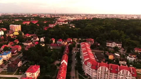 3 flying on a copter over a beautiful green city, old town, Europe Vídeo Stock 265236709