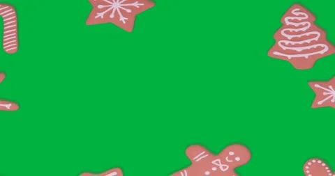 3 gingerbread cookie shapes with white icing floating on transparent background, Stock Footage 317479763