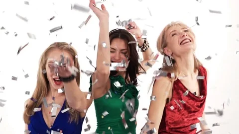 3 girls throwing confetti at a party on ... | Stock Video | Pond5