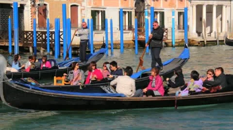 3 Gondolas with people pass by Stock Footage 20496128