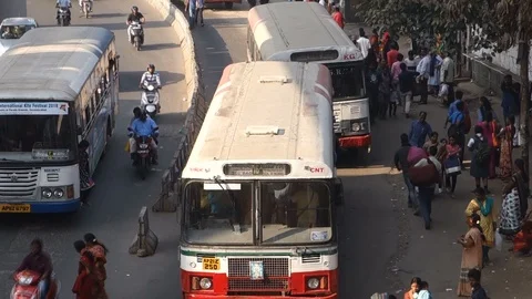 3-High-Angle-View-busy-bus-stop-people-traffic Stock Footage 89420383