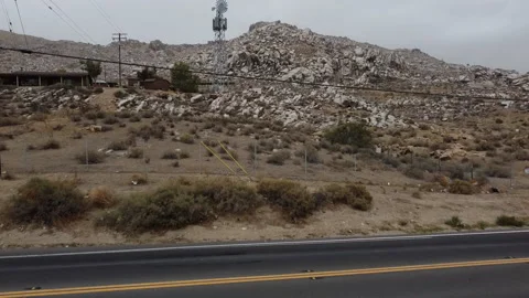 3 Hillside building and Windmill Stock Footage 163692946