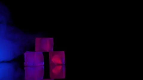 3 ice cubes on a table at a party for coctail Stock Footage 111574384