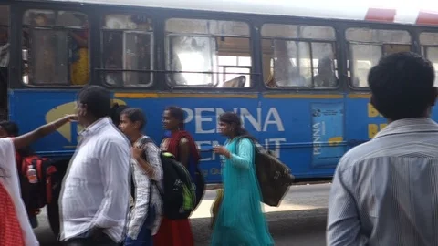 3-indian-boarding-bus-at-bus-stop Stock Footage 89389586