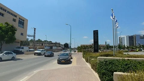 3 Israel flags in front of building in Petach tikva industrial zone Stock Footage 94803311