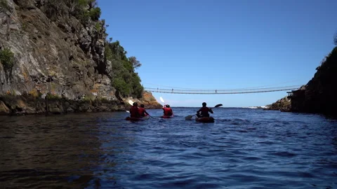 3 kayaks going down a river point of view Stock Footage 199220606