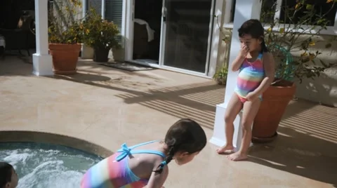 3 KIDS JUMP INTO A JACUZZI Video stock 54621841