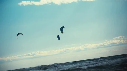 3 Kitesurfers in the Ocean Stock Footage 95287963