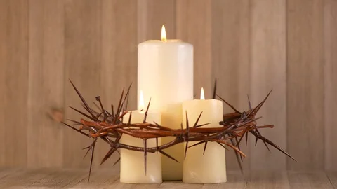 3 Lit Candles surrounded by Crown of Thorns. Communion Stock-Footage 128713568