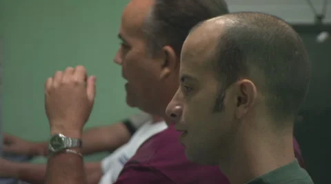 3 men in a row talking, side shot, office Stock Footage 39990177