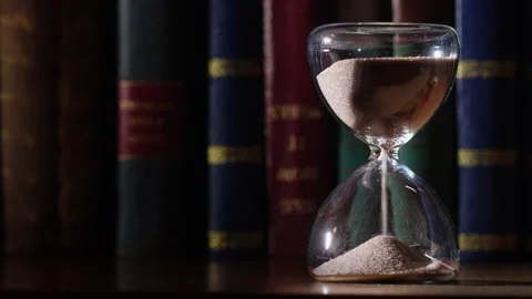 3 Minute Hourglass, Steady Flow, Bookshelf Background Stock Footage 331106481