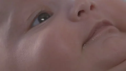 3 Month Old Baby On Back Close Up Face Expressions Happy Angled Stock Footage 241380366